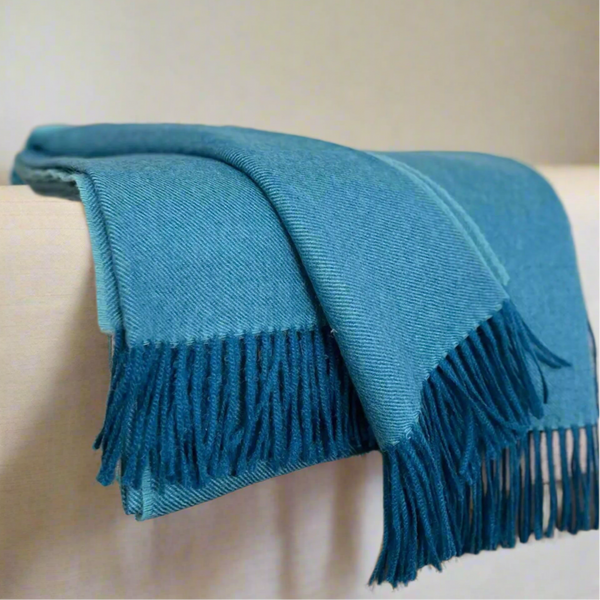Baby alpaca throw in blue 