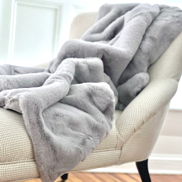 Faux fur throw in gray