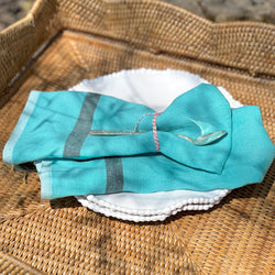 Stonewashed linen napkins in aqua blue by caravan 