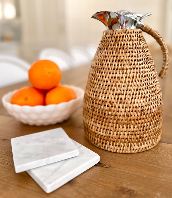 Rattan carafe by artifacts 