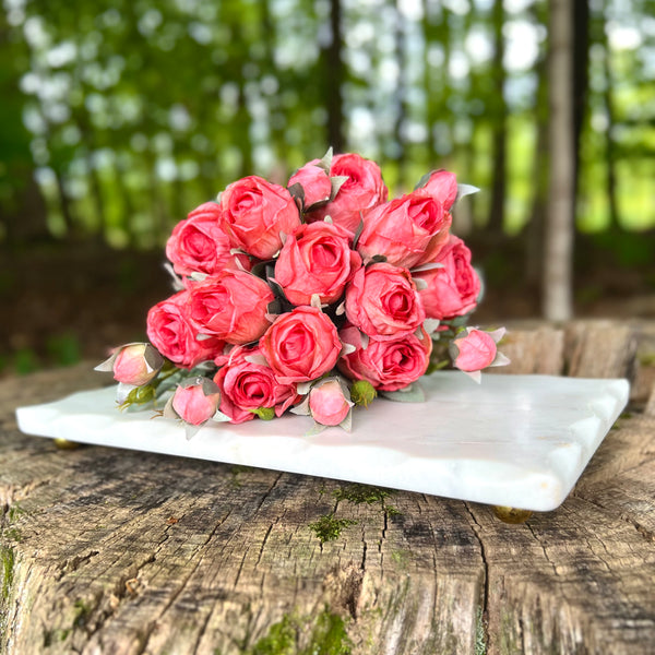 Faux flower stems in pink orange roses