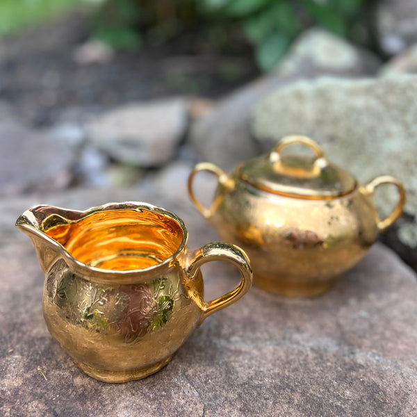vintage gold luster sugar bowl and creamer by Richard Sinori made in Italy.