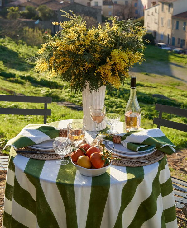Green and white striped tablecloth 