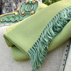Baby alpaca throw in green