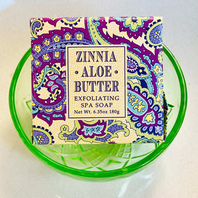 Greenwich Bay exfoliating soap in Zinnia Aloe Butter wrapped in purple paisley paper, shea butter soap, gift soap