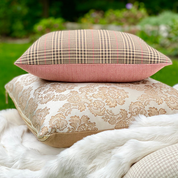 The Brummel black, tan and berry glen plaid chair lumbar pillow with berry chevron fabric on back. Shown stacked on top of our larger elegant cream and toffee trellis patterned Antoinette pillow.