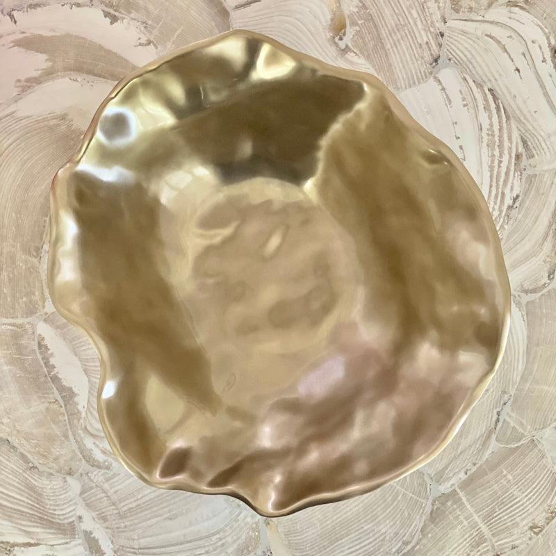 Top view of the Maia Bowl with champagne gold finish, from the Sierra Modern Collection by Beatriz Ball. Shows wavy handmade edge.