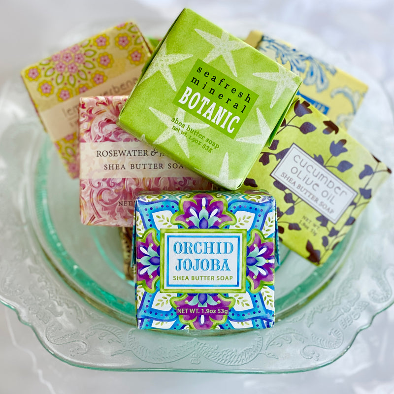Greenwich Bay botanical shea butter soap collection, all wrapped in pretty papers, gift soaps