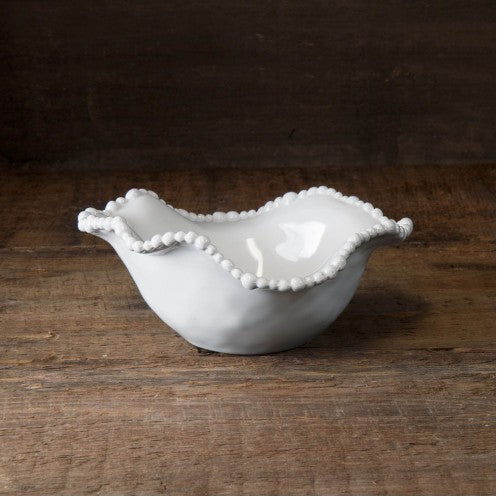 Pretty white melamine bowl with wavy pearl edge by Beatriz Ball.